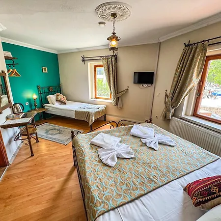 Готель Nomads Cave & Rooftop Гьореме