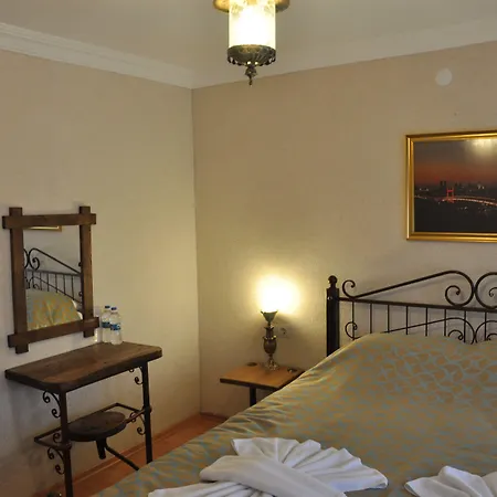 Nomads Cave & Rooftop Готель Гьореме